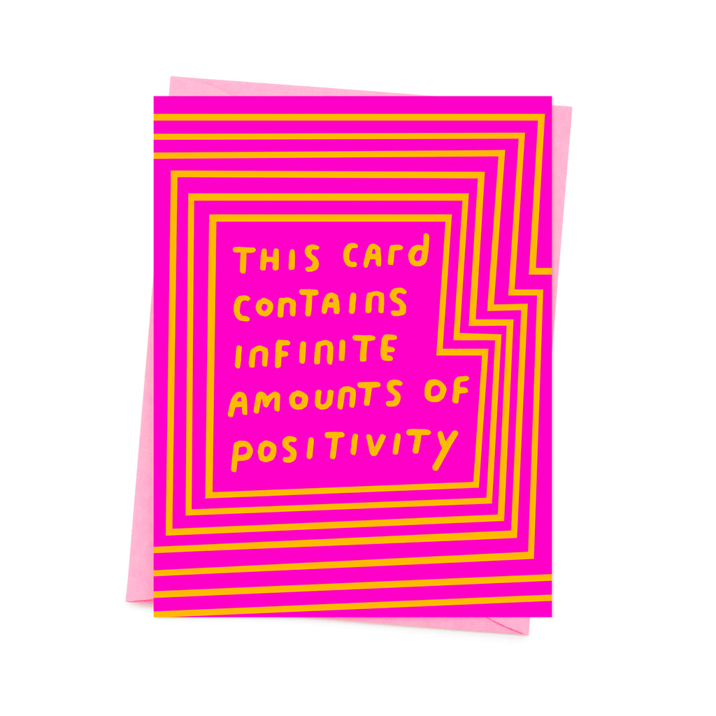 yellow 'this card contains infinite amounts of positivity'  written on the pink base