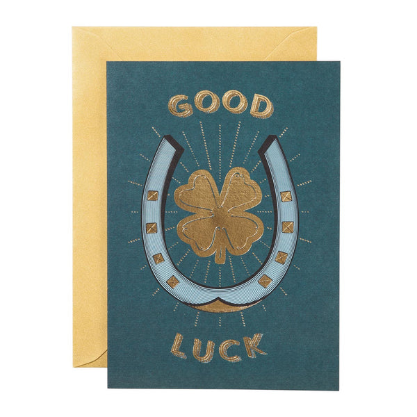Good Luck Card - Chase And Wonder, horseshoe on blue base. good luck written with golden letters 